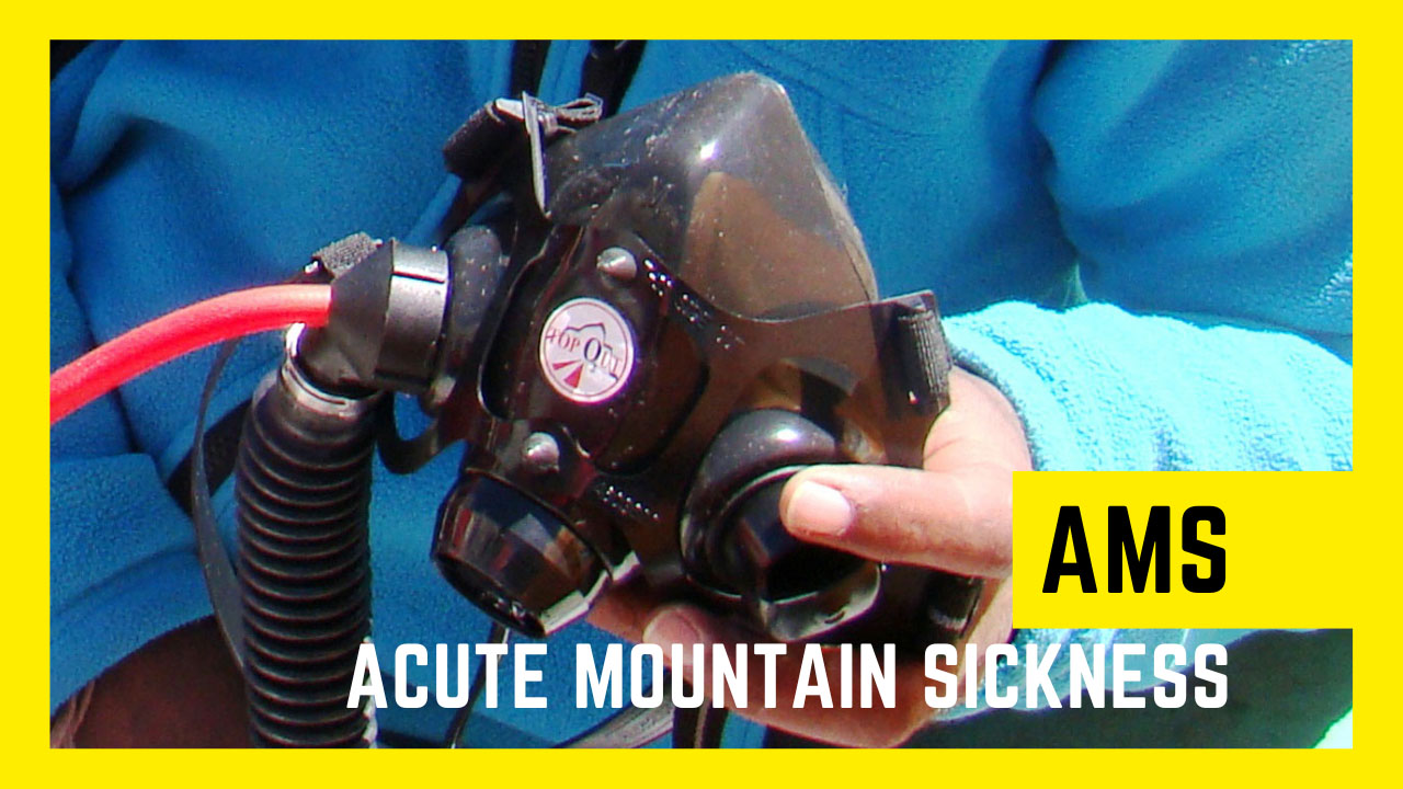 A guide holds an O2 mask in his hand while discussing (AMS) Acute Mountain Sickness