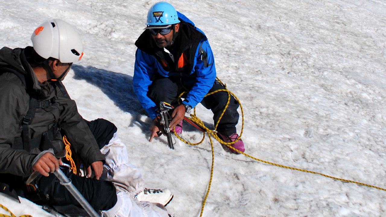 On a crevasse rescue training, Pankaj Lagwal teaches how to make an anchor
