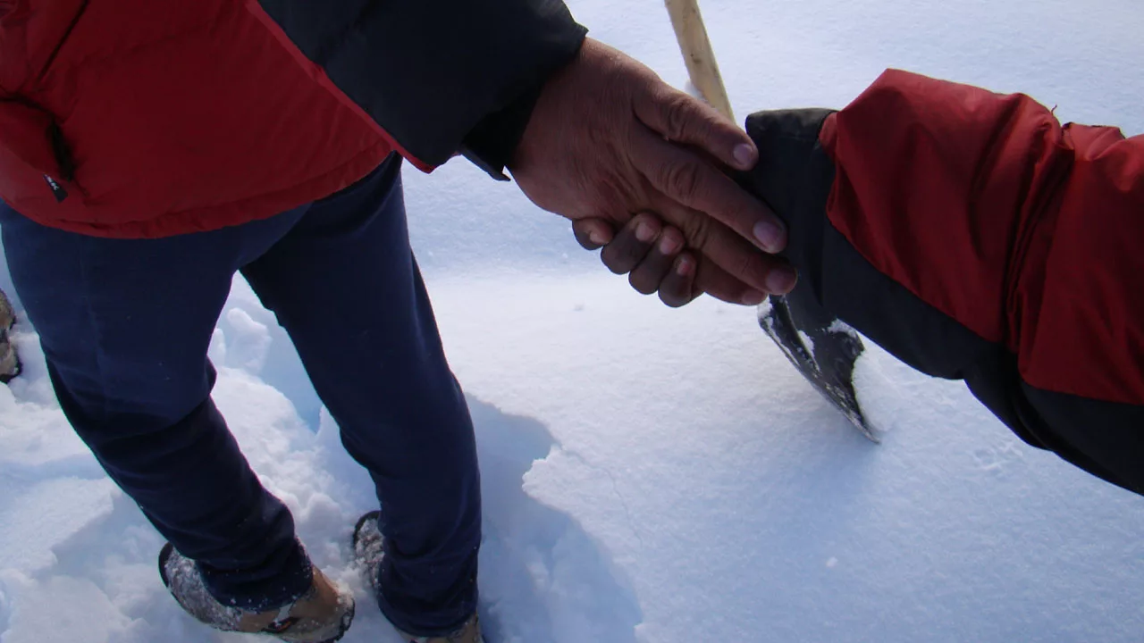 Holding hands during glacier training