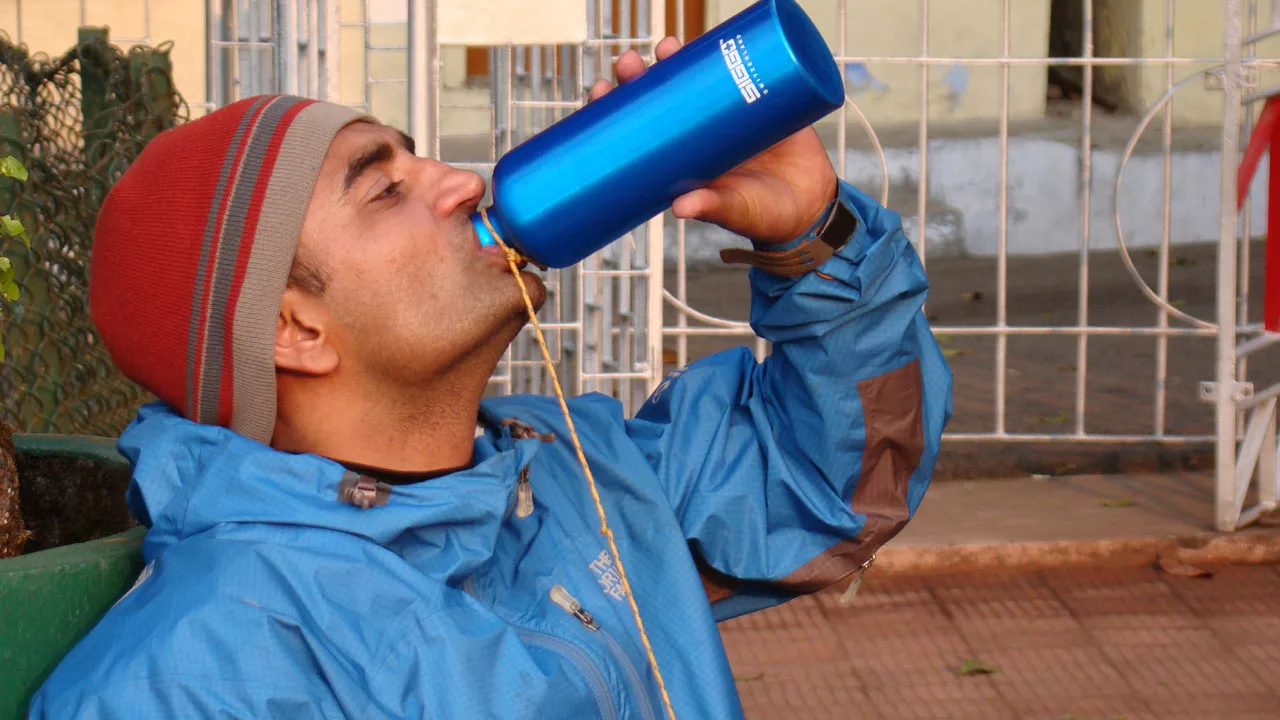 Pankaj Lagwal gulping water from water bottle