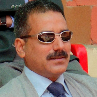 Colonel Neeraj Rana's profile photo in formal clothes with shades principal of all three Mountaineering Institutes of India