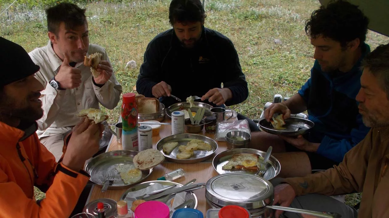 Clients having meal on Thakur Kuan Campsite on Pin Parvati Trek