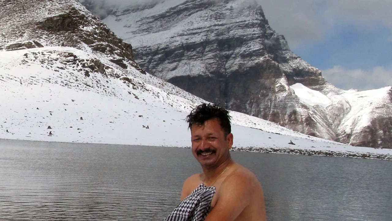 Surender Mahant, a mountain guide, takes a dip at Dashir Lake