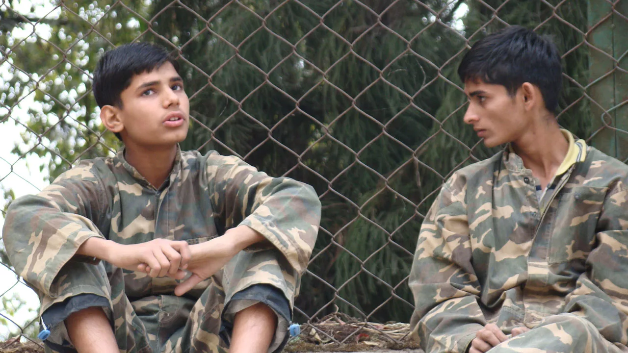 Two high school students engaged in heated debate during EL training 