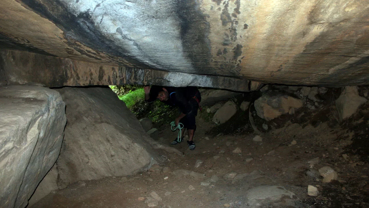 During adventure therapy client entering the cave