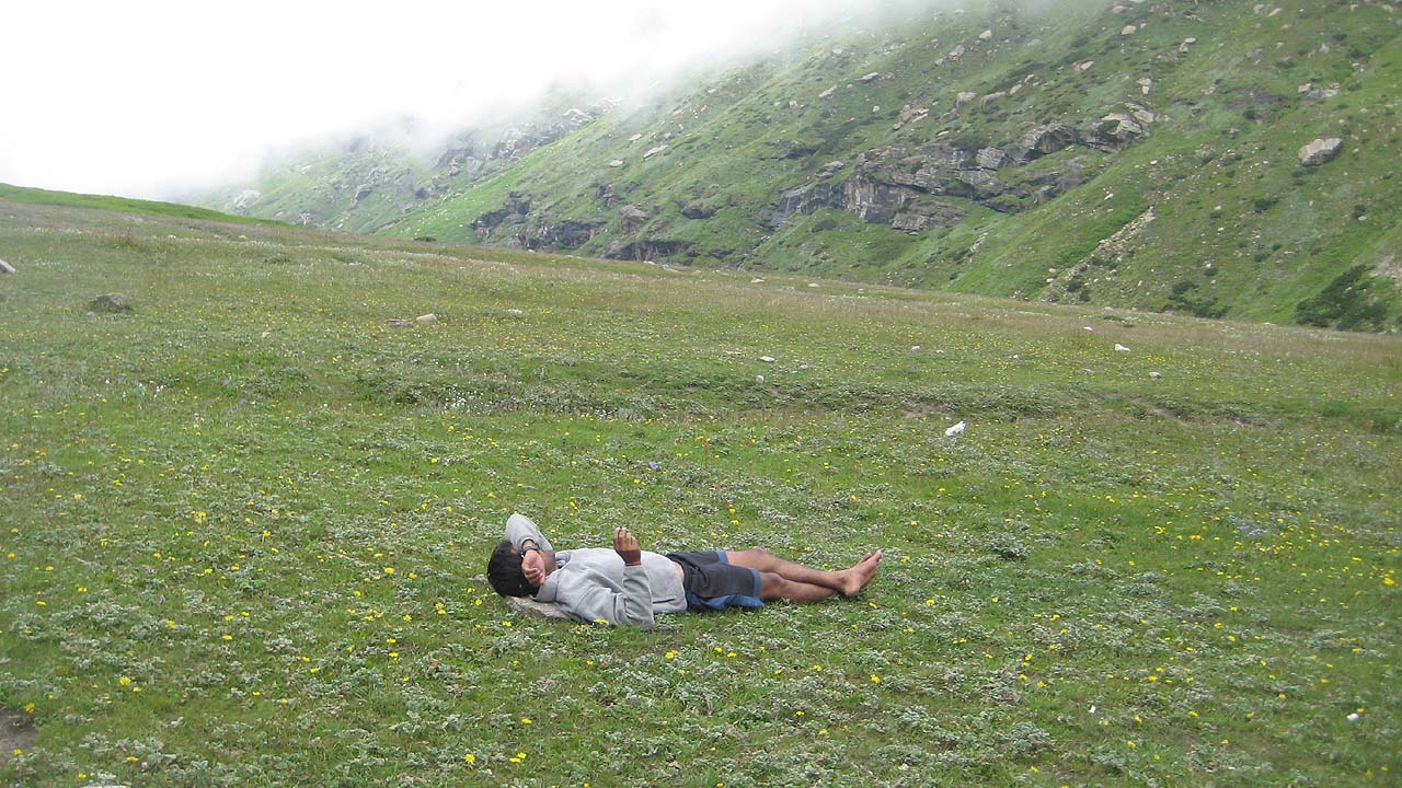 During adventure therapy lying on a meadow 
