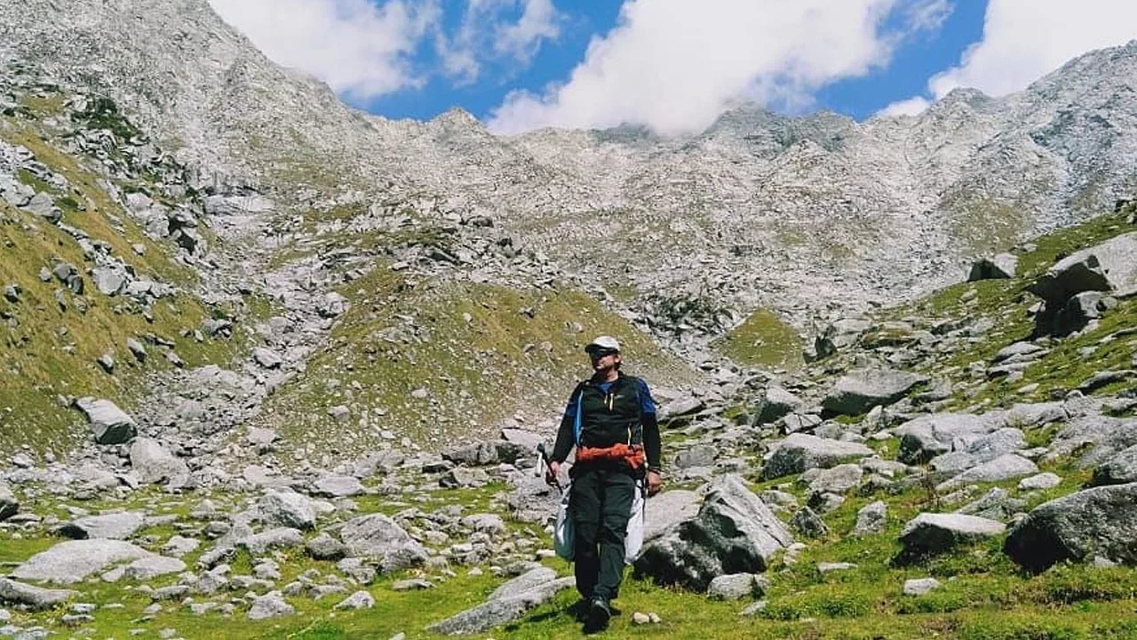 Client descending the Indrahara Pass in the Dhuladhar range dharamshala HP
