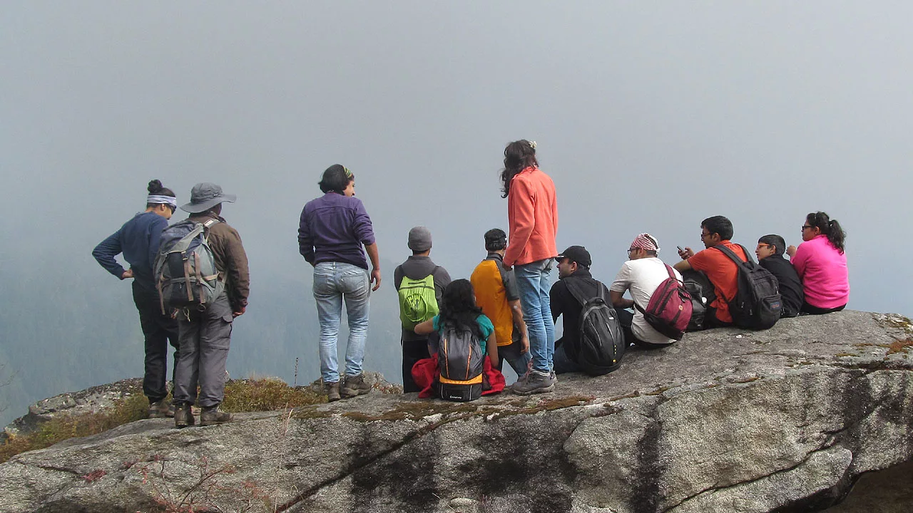 People enjoying the view on a trek in Himachal