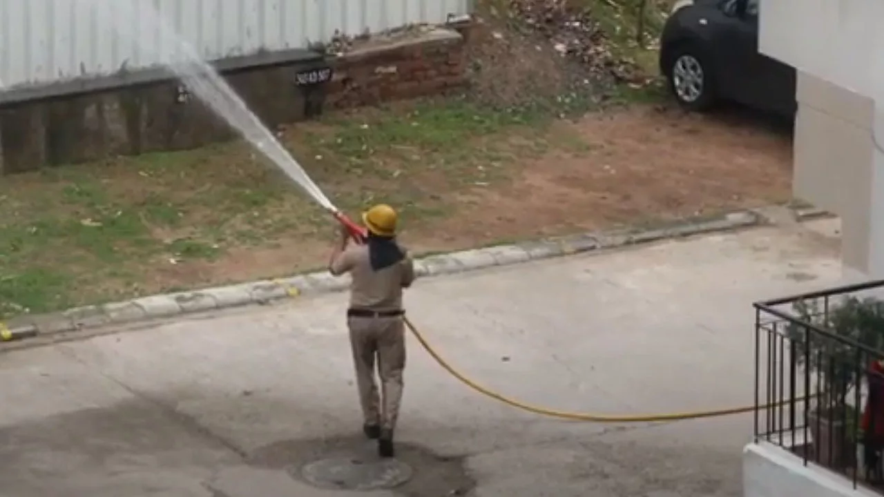 Fire Fighter with hose 