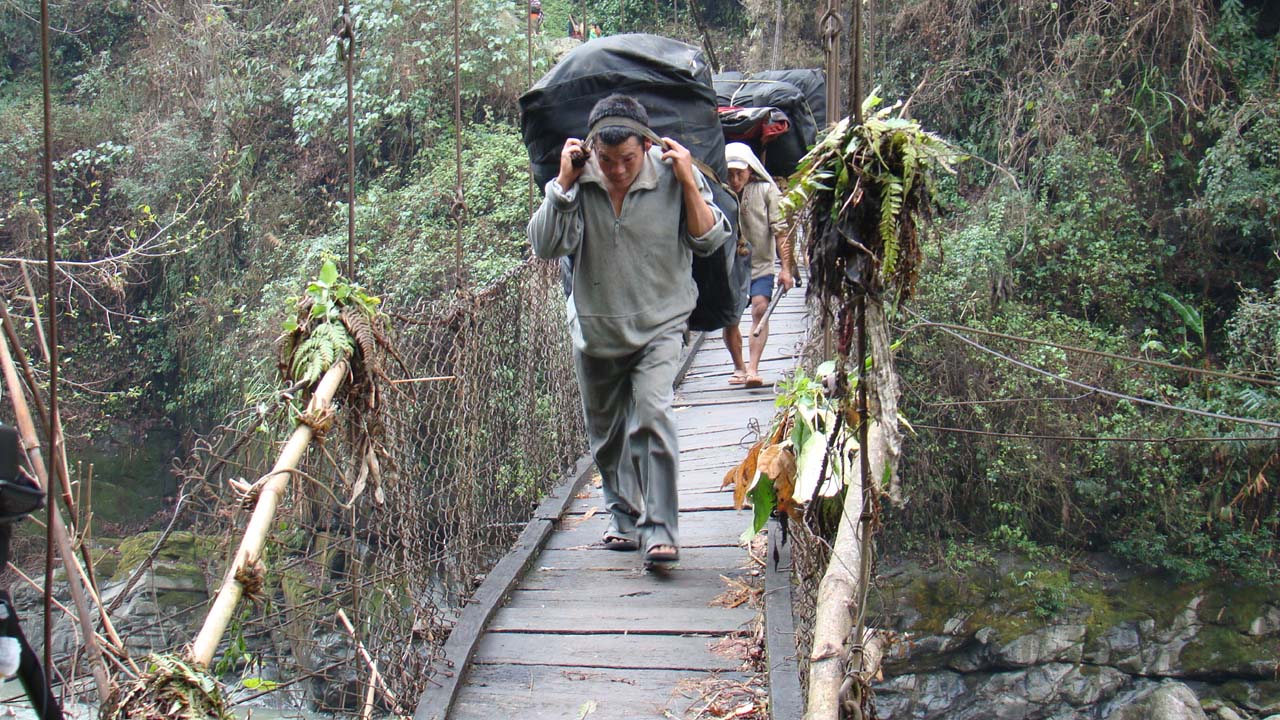 On the bridge, Potter is transporting a big and heavy load