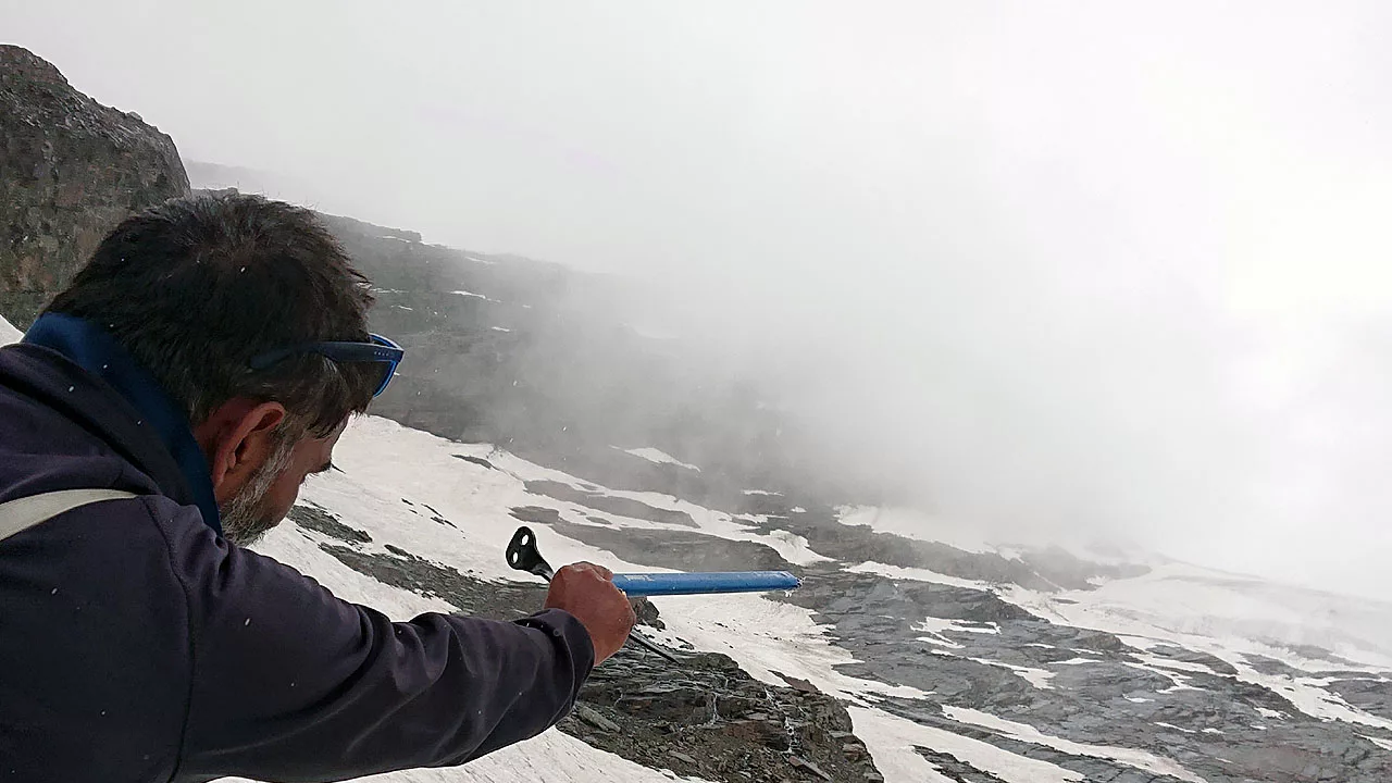 Pankaj Lagwal Using an Ice Axe to Point
