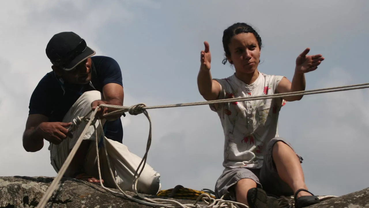 Trainee examining rope work and assisting in the setup of Equalised Anchors
