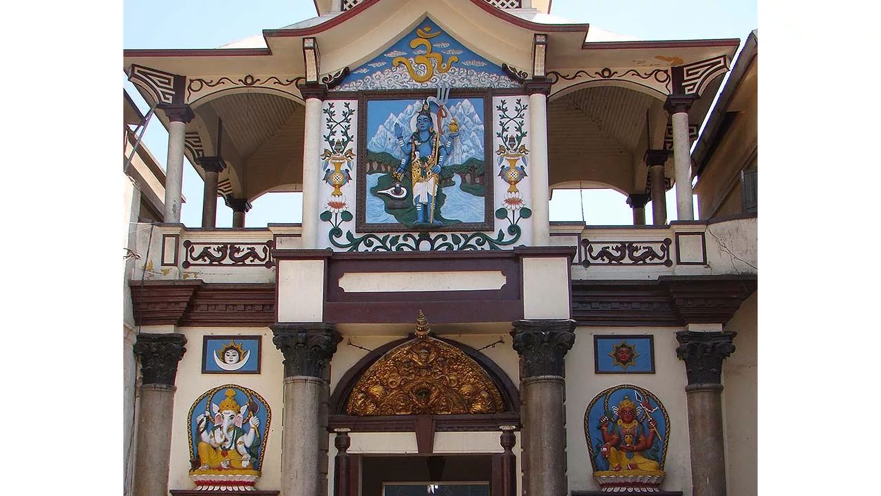 Gate of Pashupatinath Temple with Shiva  is atop the gate with Parvati to the right and Ganesha to the left