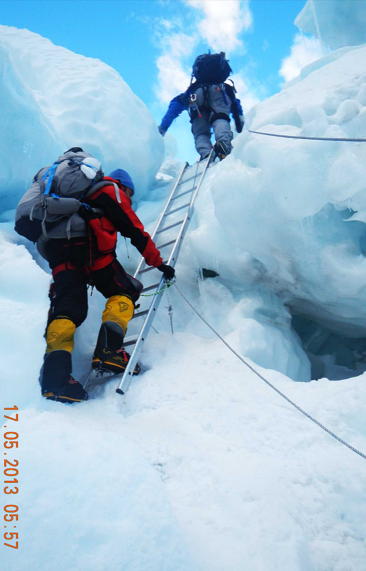 Ajay Sohal Crossing Crevasse on Khumbu Glacier