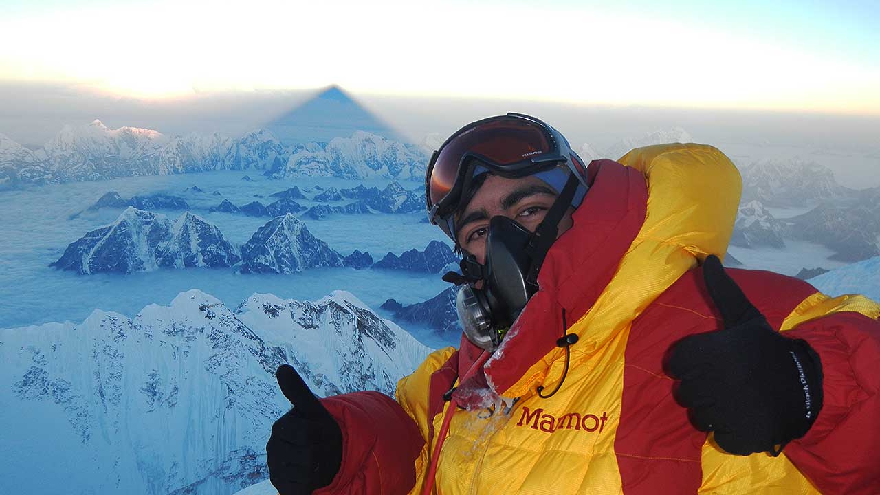 Ajay Sohal showing thumbs up on Everest Summit