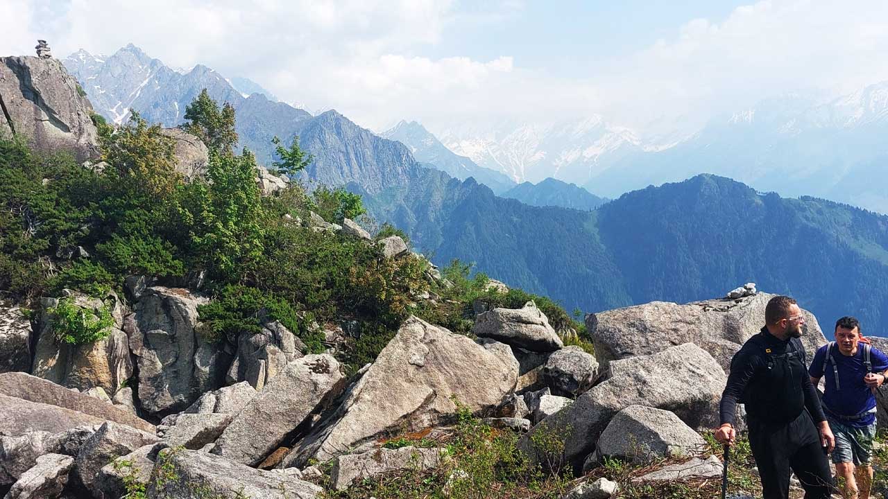 Hikers in a rocky terrain