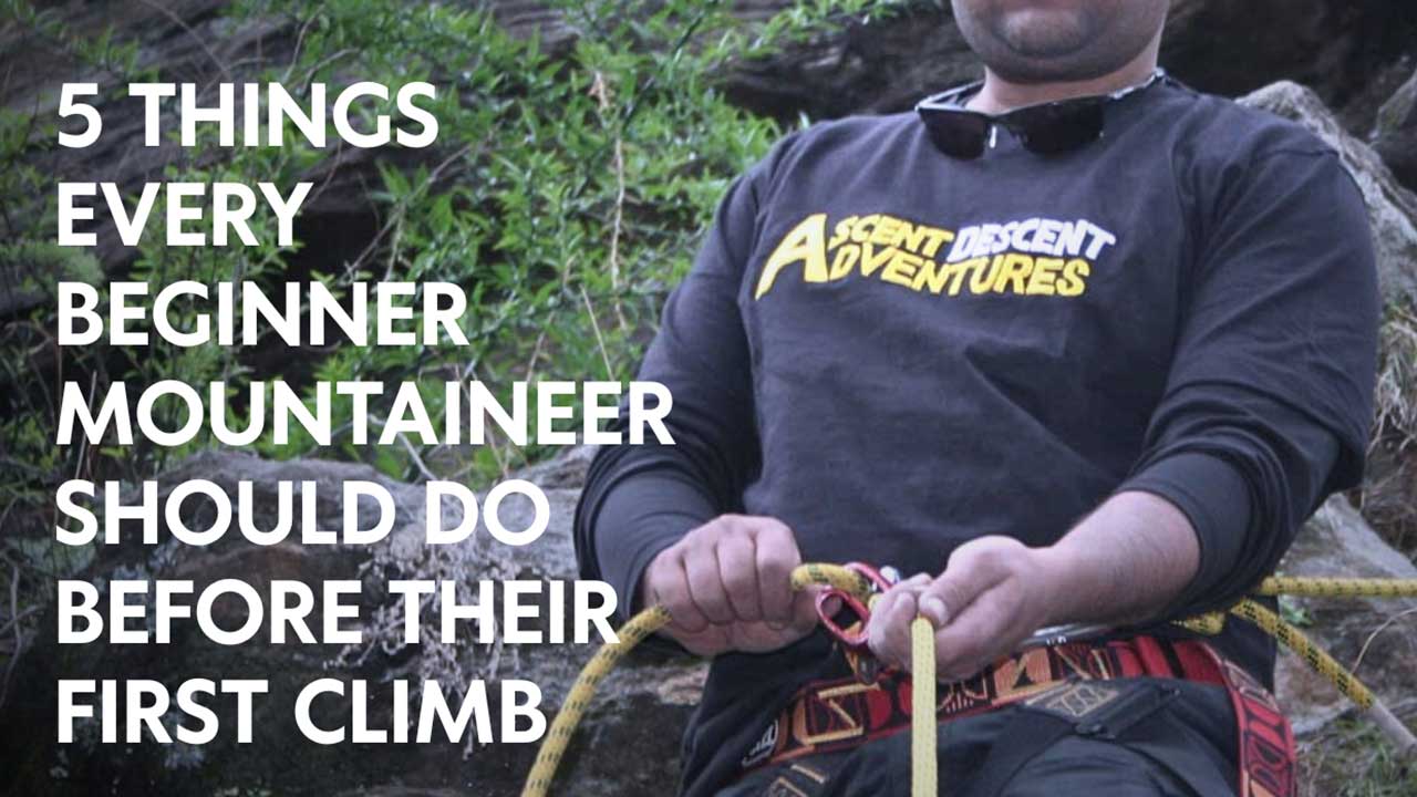 student belaying with ATC attached to his harness and text reads 5 Things Every Beginner Mountaineer Should Do Before Their First Climb