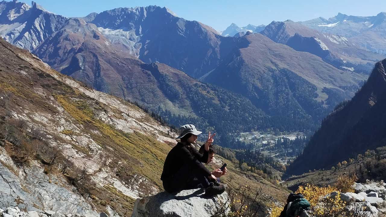 ADA Clients stopped at the Beas Kund Glacier moraine. view of pir panjal range and beas valley solong nallha 
